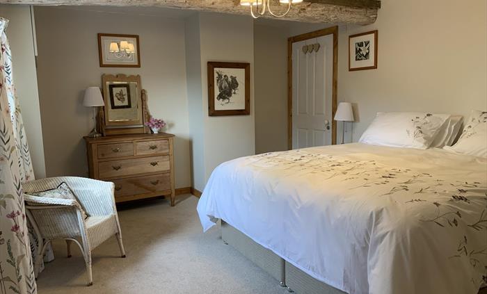 Woolly theme with British wool carpet, bed and mattress